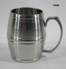 Barrel shaped silver coloured , pewter tankard.