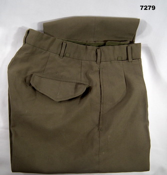 Polyester full length Khaki trousers.