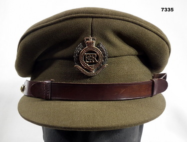 Khaki Army Officer's peaked cap.