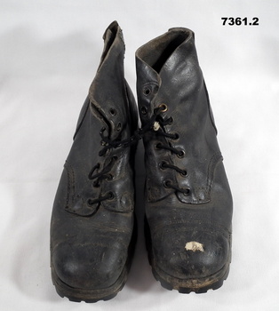 Pair of black leather boots.