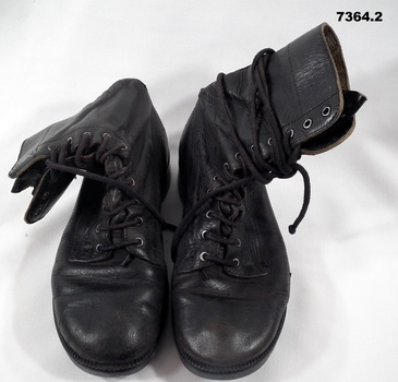 Pair of black leather boots.