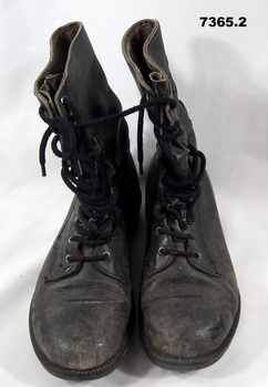 Pair of black leather boots.