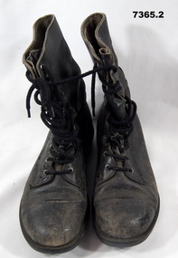 Pair of black leather boots.