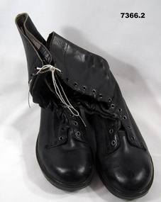 One Pair of black leather boots.