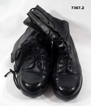 One pair of black leather boots.