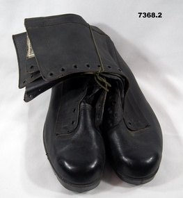 One pair of black leather boots.