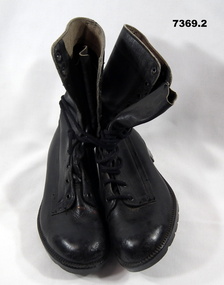 One pair of black leather boots.