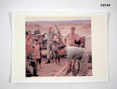 Colour photograph of a group of Vietnam era Australian soldiers.