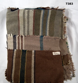 Blanket - machine stitched patches of blankets in brown tones, wool.