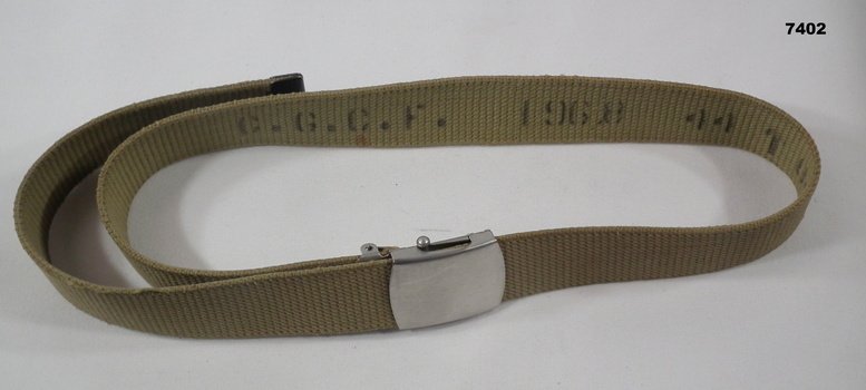 Khaki coloured cotton webbing belt.