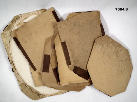 Eight cardboard backing boards from the original Beehive Honour Roll.