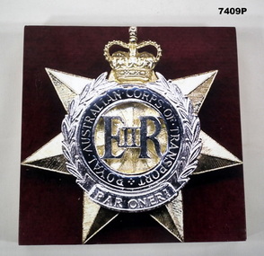 Mounted colour photograph of Transport Corps Badge.