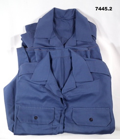 Two blue Air Force cadet shirts.