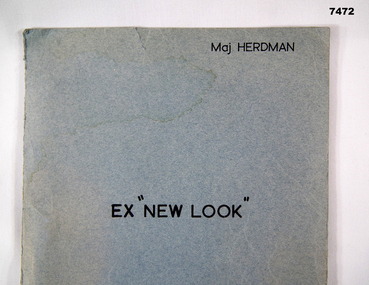Folder containing printed notes on white, green and pink coloured paper.