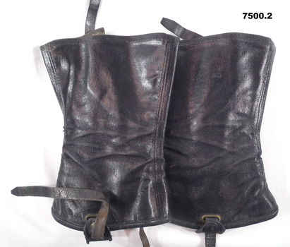 Pair black stiffened canvas gaiters.
