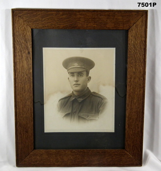 Framed black and white portrait photograph.