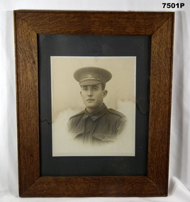 Framed black and white portrait photograph.