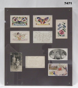 Framed collection of WW1 postcards.