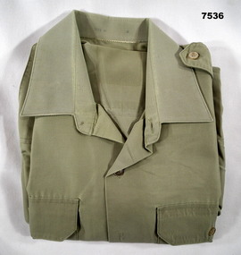 Khaki long sleeved poly cotton Australian Army shirt.