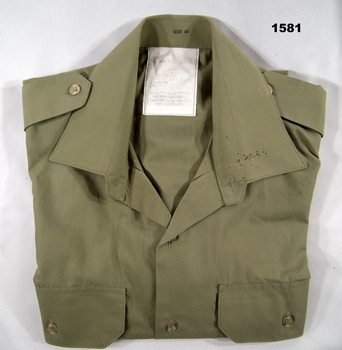 Short sleeved Khaki Army shirt.