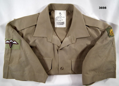 Short sleeve Khaki Army shirt.