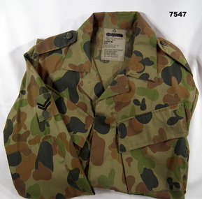 Army Camouflage shirt with long sleeves.