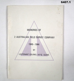 Cream coloured covered booklet with Survey Corps Colour patch