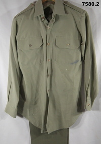 Khaki Army shirt and trousers.