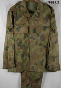 Army camouflage shirt and trousers.