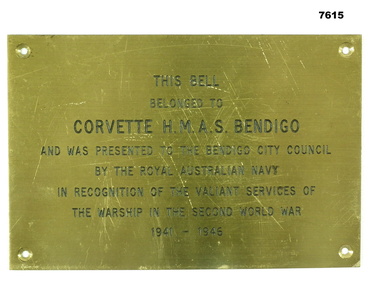 Brass Plaque describing the presentation of the Bell from HMAS BENDIGO to Bendigo City Council.