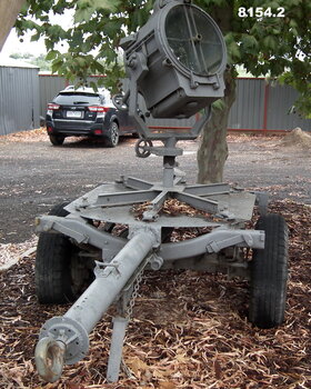 Mobile search light on trailer two wheeled.