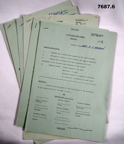Collection of quiz question and answer exercises on green A4 paper.