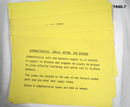 Series of seven yellow coloured cards with printing in black type.