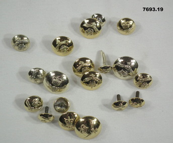 RAAF Uniform buttons of various sizes.
