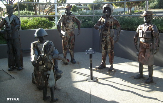 Six metal sculptures representing War & Peace.