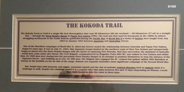 Text panel as part of the framed photos Kokoda trail.