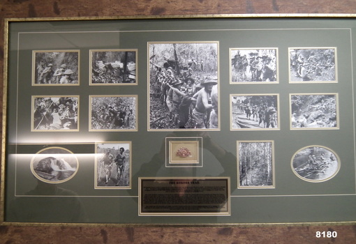 Framed photos of the Kokoda Trail campaign.