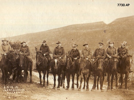 Photo of soldiers on horse back on leave England.