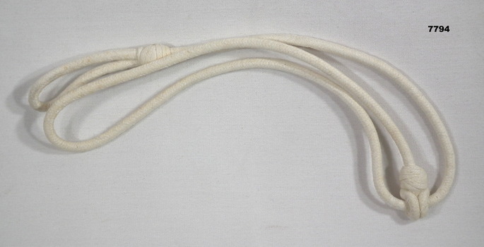 White ceremonial lanyard - Royal Australian Artillery.