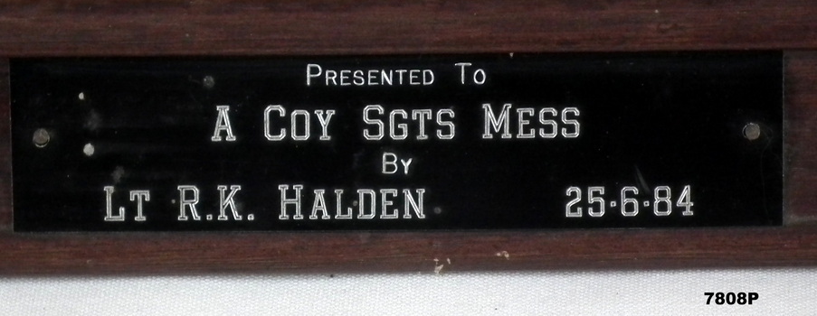 Plaque from the Framed Photograph of an Army Parade.