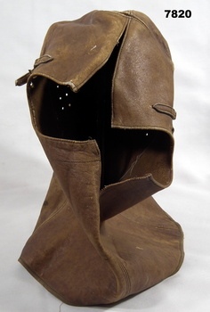 Brown leather full flying helmet.
