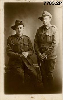 Studio portrait of Young, Bertram John 304, 57th Btn on left