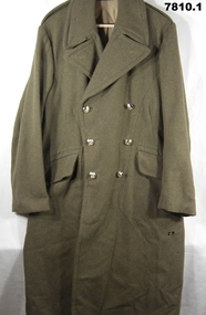 Army great coat and beret.
