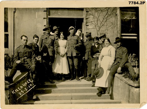 An informal group enjoying their leave outside the Graham Hotel Killarney