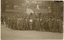 Group photograph of 57th Battalion medal recipients taken outside Exeter cathedral