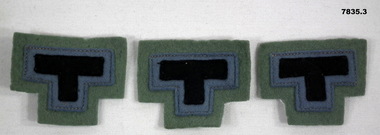 Three 2/23 Battalion colour patches.