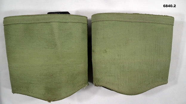 Green webbing gaitors and belt.