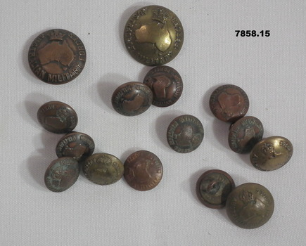 Collection of fifteen copper coloured army uniform buttons.