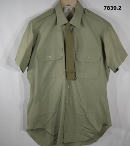 Khaki Army uniform - shirt and necktie.