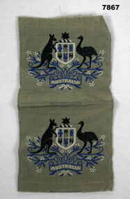 Conjoined W.O.1 badges featuring the Australian Coat of Arms.